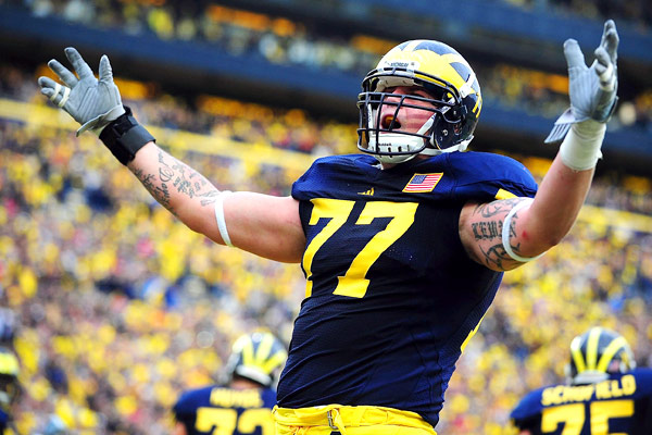 http://www.michiganreview.com/wp-content/uploads/2013/07/The-return-of-Taylor-Lewan-gives-the-Wolverines-stability-on-the-offensive-line-Photo-Courtesy-of-ESPN.jpg