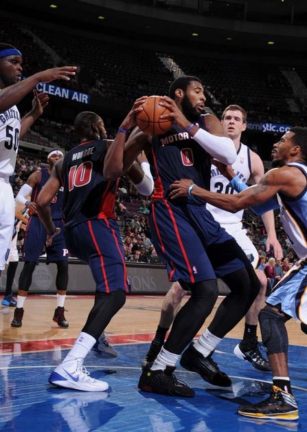 Andre Drummond fights for a rebound with Memphis' Mike Conley in the first quarter of Sunday's game at the Palace. The Grizzlies beat the Pistons, 112-84 (Photo courtesy of Allen Einstein/Detroit Pistons).