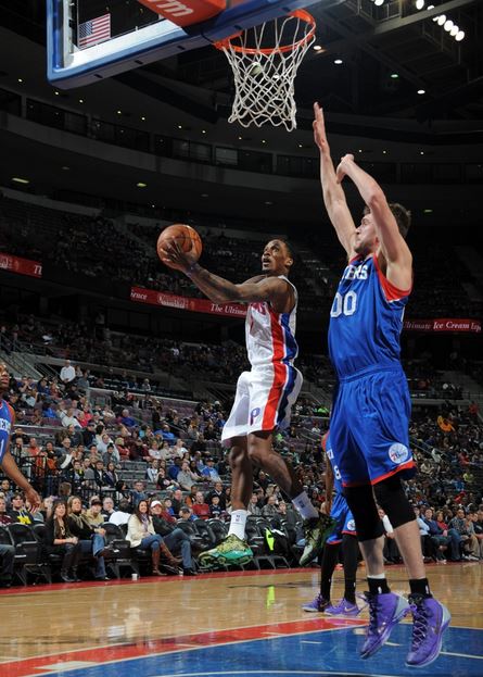 Brandon Jennings drives to the basket against Philadelphia's Spencer Hawes in the second quarter of Saturday's game. The Pistons defeated the 76ers, 113-96 at the Palace of Auburn Hills (Photo courtesy of Allen Einstein/Detroit Pistons)
